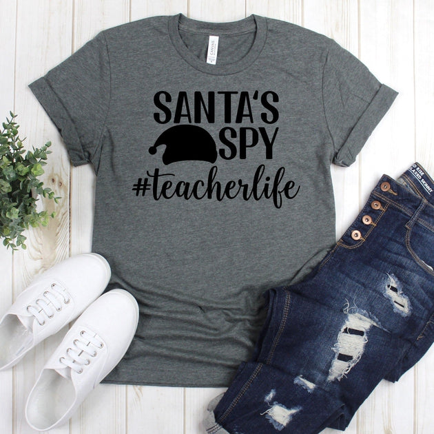 www.teestore.io-Christmas Teacher Shirt - Santa's Spy #Teacherlife Elf Hat - Christmas Shirts - Christmas T-shirt - Holiday Shirts Tshirt Funny Sarcastic Humor Comical Tee | TeeStore.io